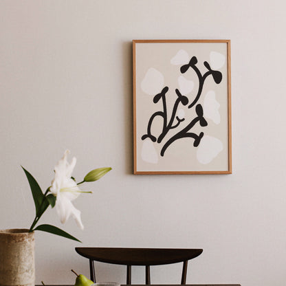 Grafisk pionposter upphängd på ljus, minimalistisk vägg