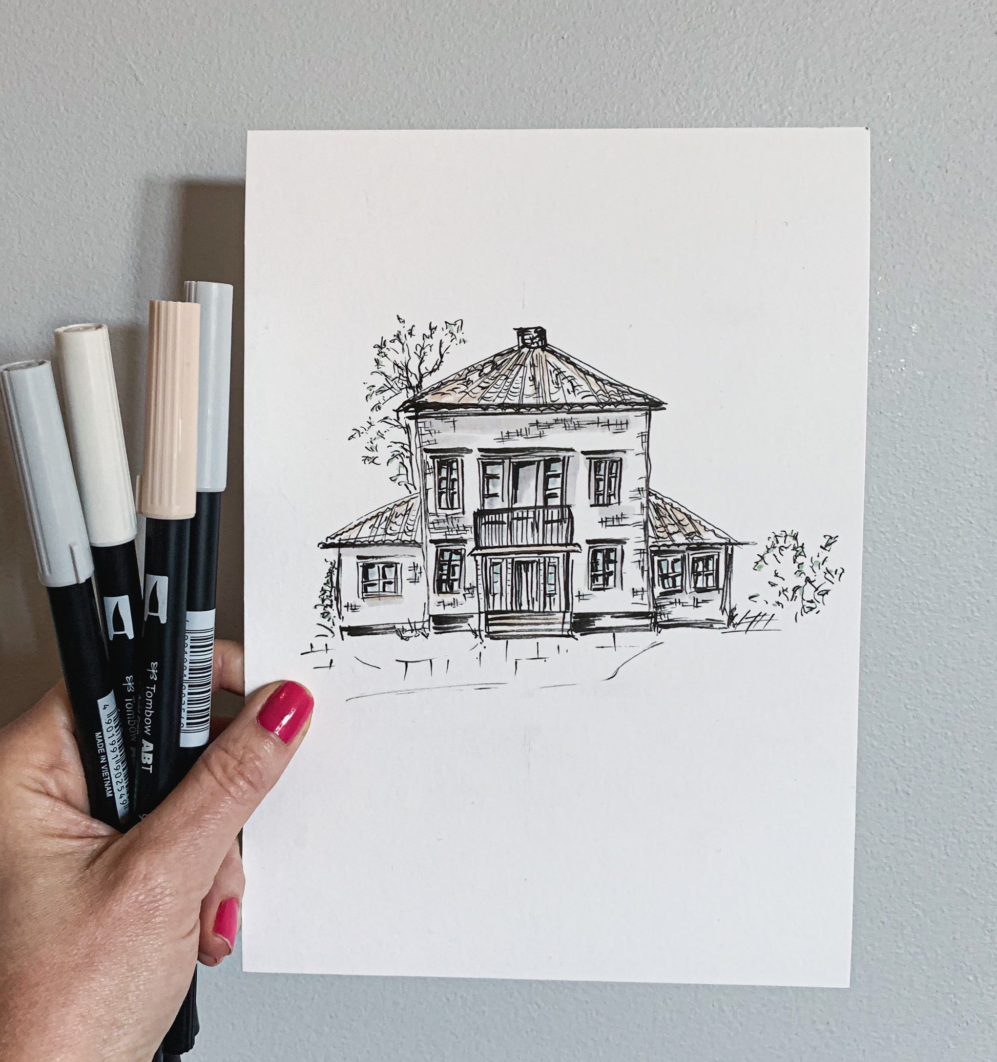 En handritad husillustration som ett tidlöst minne av ett älskat barndomshem.