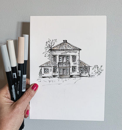 En handritad husillustration som ett tidlöst minne av ett älskat barndomshem.