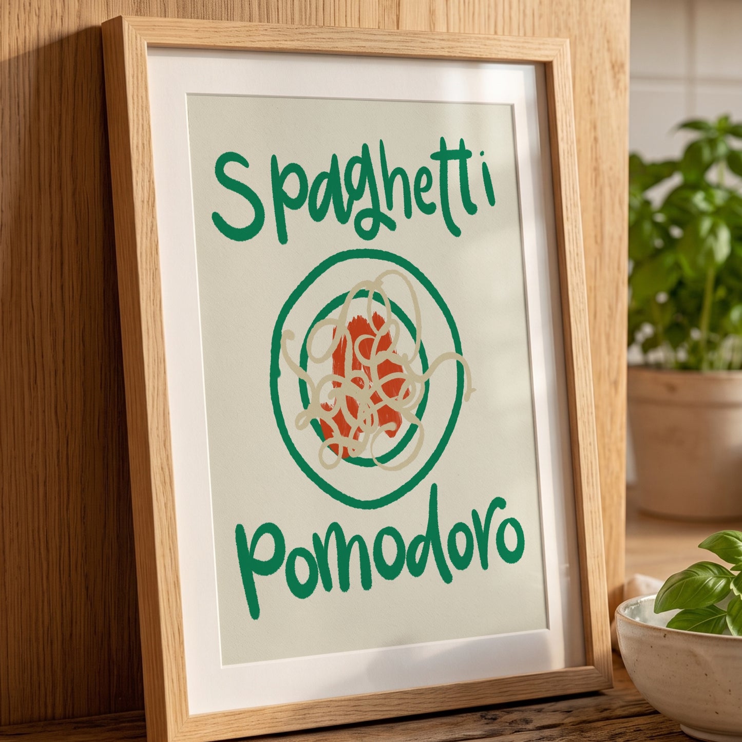 Pastaposter Spaghetti Pomodoro på konsolbord med grön växt